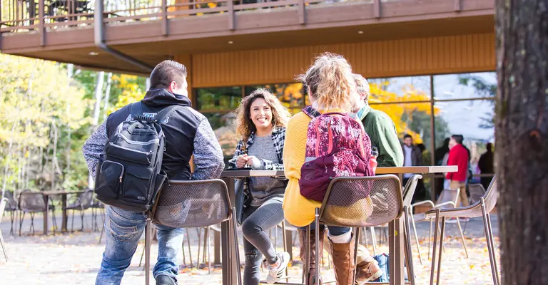 students_sitting_patio_fall Thumbnail