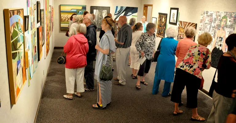 people viewing art in the nicolet art gallery