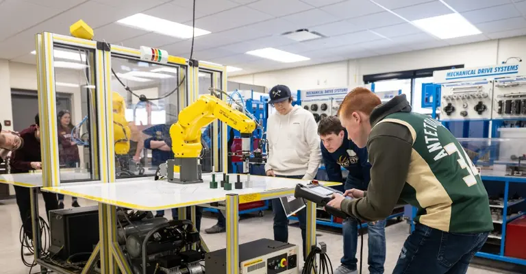 Students in Nicolet College's electromechanical lab.