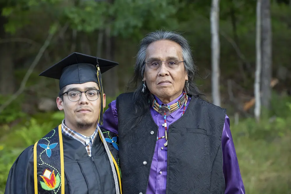 Graduate with family member