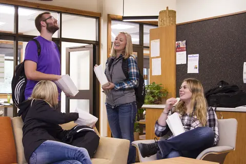 students eating popcorn in rec room