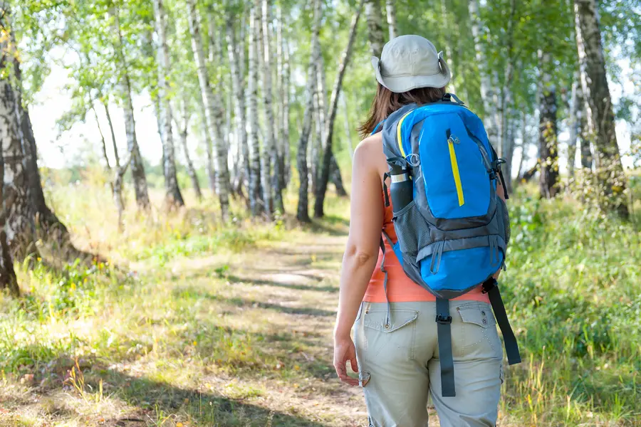 woman hiking in the woods